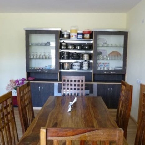 Dining area at Orion Home guesthouse in Leh, Ladakh, India.